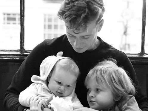 Jude Speleers with his father and baby sister.